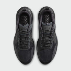 Top-down view of a pair of Nike Lunar Roam Men's trainers in dark smoke grey, highlighting the lace-up closure and integrated Magwire cables.