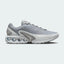 Nike Air Max DN Men's running shoes in grey, side profile showing visible Dynamic Air unit in the heel, textured upper, and sleek silhouette.