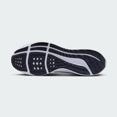 View of the outsole of the Nike Air Zoom Pegasus 40 Men's black running trainers, showing the durable rubber waffle-inspired tread pattern for road traction.