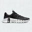 Nike Free Metcon 5 Men's training shoes in black and anthracite grey with white accents, side profile showing mesh upper, flexible forefoot, and stable heel.