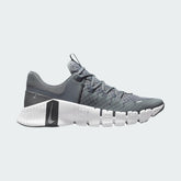 Nike Free Metcon 5 Men's training shoes in dark smoke grey and black, side profile showing mesh upper, flexible forefoot, and stable heel.
