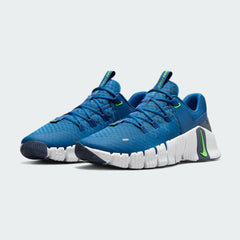 Angled view of two Nike Free Metcon 5 Men's blue training shoes, side by side, showcasing their dynamic design and supportive structure.