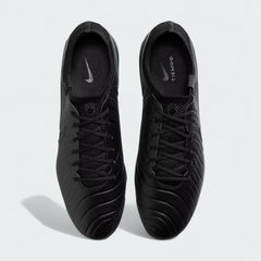 Top-down view of a pair of Nike Legend 10 Elite FG men's football boots in black, highlighting their streamlined silhouette and lacing system.