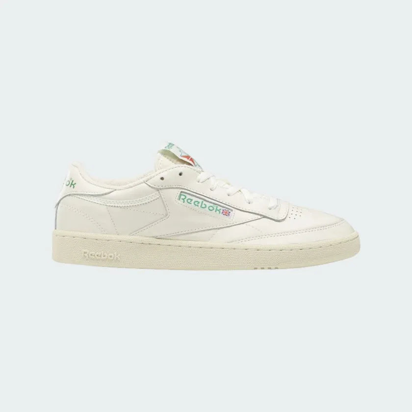 Reebok Classic Club C 85 Vintage unisex trainers in chalk (off-white) leather, side profile showing clean lines and classic Reebok window box logo with green accents.