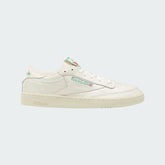 Reebok Classic Club C 85 Vintage unisex trainers in chalk (off-white) leather, side profile showing clean lines and classic Reebok window box logo with green accents.