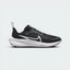 Highlights the high-velocity sweep of the crisp White Nike Swoosh, showing the technical, multi-toned texture of the Black and Iron Grey mesh upper resting above the clean white foam midsole wall.
