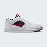 Jordan Stadium 90 Men's trainers in white, gym red, and black, side profile showing leather upper, classic Swoosh, and Air Jordan 5-inspired mesh details.