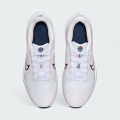 Top-down view of a pair of Nike Downshifter 12 Premium Women's training shoes in white, highlighting their streamlined silhouette and lace-up closure.