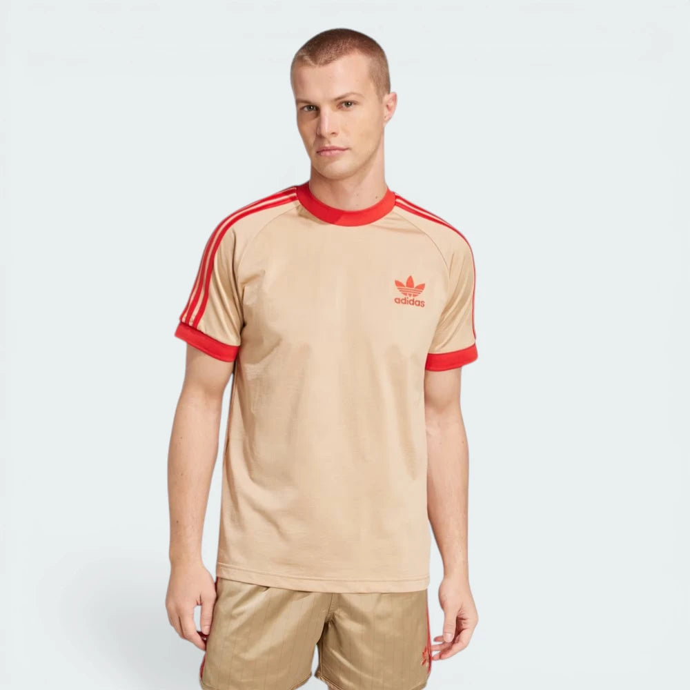 Model profile of the Magic Beige David Beckham tee, highlighting the slim, contoured fit and the clean sleeve finish.
