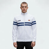 Ellesse Rimini Track Jacket Men's in white, front view shown a male model showing the full zip, stand-up collar, and iconic blue and red stripes across the chest and sleeves.