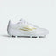 Highlights the high-velocity Gold Metallic 3-Stripes slashing across the professional depth of the Cloud White Fiberskin upper.