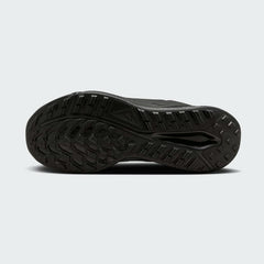 View of the outsole of the Nike Juniper Trail 2 Gore-Tex Women's black trainers, showing deep, multi-directional rubber lugs for trail traction.