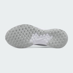 View of the outsole of the Nike Revolution 7 Men's white running trainers, showing the durable rubber tread pattern with flex grooves for traction.