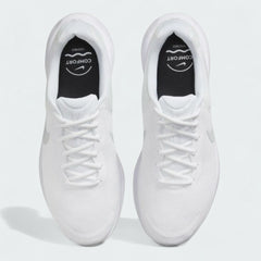 Top-down view of a pair of Nike Revolution 7 Men's running trainers in white, highlighting their streamlined silhouette and lace-up closure.