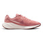 Highlights the streamlined lateral profile showing the Red Stardust engineered mesh upper, soft-pink-to-sepia gradient Nike Swoosh, sculpted white foam midsole, and dark Red Sepia rubber outsole tread.