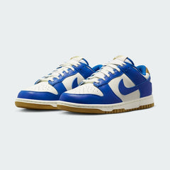 Nike Dunk Low Women's White Leather Trainers FB7173-141 angled view showing colour-blocked overlays and retro basketball silhouette