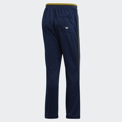 Adidas Recycled Track Pants Men's in dark blue, back view showcasing the plain design and ribbed cuffs.