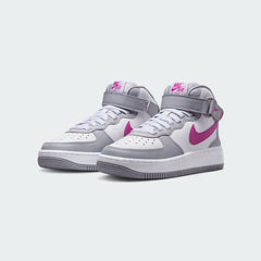 Angled view of two Nike Air Force 1 Mid EasyOn Juniors' grey trainers, side by side, showcasing their iconic design and clean aesthetic.