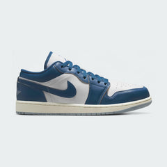 Air Jordan 1 Low Special Edition Men's trainers in white with blue accents, side profile showing classic leather upper, perforated toe box, and Nike Swoosh.