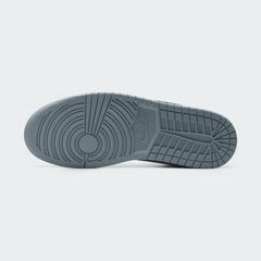 View of the outsole of the Air Jordan 1 Low Special Edition Men's white trainers, showing the durable rubber sole with classic traction pattern.