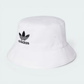 Side profile of the White Adidas bucket hat, highlighting the flexible all-around brim and its relaxed silhouette.