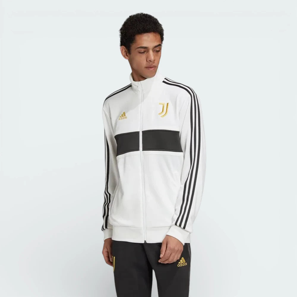 Close-up of the front of the jacket, focusing on the detailed gold embroidery of the Juventus crest and the high-quality zipper.