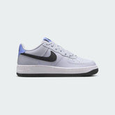 Nike Air Force 1 Juniors Grey Trainers FV5948-003 side view showing grey leather upper, tonal Swoosh, and classic Air sole