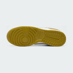 View of the outsole of the Nike Dunk Low Retro Men's bronze sneakers, showing the durable rubber sole and pivot circles for traction.