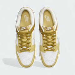 Top-down view of a pair of Nike Dunk Low Retro Men's sneakers in bronzine and coconut milk, highlighting their iconic silhouette and lace-up closure.