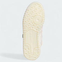 View of the outsole of the Adidas x Ivy Park Forum Low women's trainers, showing the durable rubber sole and classic traction pattern.