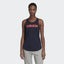 Focuses on the high neck collar and the vibrant Signal Pink linear logo.