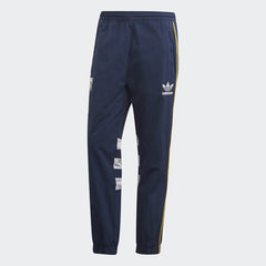 Adidas Arsenal 91-93 Track Pants Men's in collegiate navy, front view showing elastic waistband, red 3-Stripes down the legs, and embroidered Arsenal FC crest.