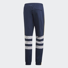 Adidas Arsenal 91-93 Track Pants Men's in collegiate navy, back view showcasing the plain design and ribbed cuffs (or zippered cuffs).