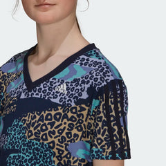 Close-up zoom on the fabric of the Adidas x Farm Rio all over print dress in navy, showing the detailed vibrant print and soft texture.