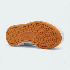 View of the outsole of the Reebok Classic Club C 85 Unisex white trainers, showing the durable rubber tread pattern.