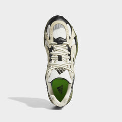 Top-down view of a pair of Adidas x Ivy Park Savage V4 sneakers, highlighting their sleek silhouette and lace-up closure.