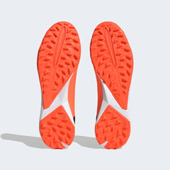 Top-down view of a pair of Adidas Predator Accuracy.3 Laceless Turf Boots in orange, highlighting their seamless laceless strike zone and control texture.