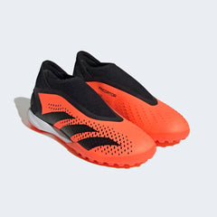 Angled view of two Adidas Predator Accuracy.3 Laceless Turf Boots in orange and black, side by side, showcasing their bold design.
