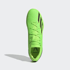 Top-down view of a pair of Adidas X Speedportal.3 Indoor Men's football boots in green, highlighting their streamlined design and lace-up closure.