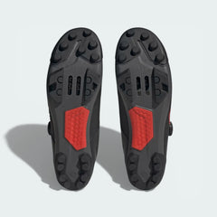 View of the Stealth Marathon rubber outsole, showcasing the cleat mounting area and the high-friction lug pattern.