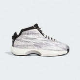 Adidas Crazy 1 Men's "Snake Skin" basketball trainers in white with black accents, side profile showing the moulded upper with snake skin texture and the sculpted midsole.