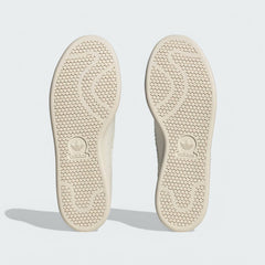 View of the outsole of the Adidas Stan Smith Recon Men's white trainers, showing the durable tonal rubber sole and classic traction pattern.