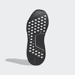 View of the outsole of the Adidas NMD_R1 women's trainers, showing the durable rubber tread pattern and visible Boost cushioning.