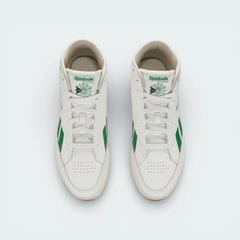 Top-down view of the off-white trainers, highlighting the clean leather toe box and the traditional lacing system extending up the ankle.