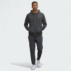 Nike Optic Zip Suit in slate grey, front view worn by a model showing the fit
