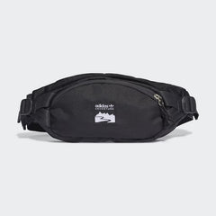 Adidas Adventure Waist Bag in black, front view showing main zip pocket, front zip pocket, and woven Adidas brand patch.