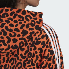 Detailed zoom on the hood and drawcord of the Adidas x Rich Mnisi Hoodie, highlighting the adjustable fit and the all-over graphic print.