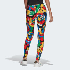 Adidas x Rich Mnisi Graphic Leggings Women's in a rose print, side profile showing the comfortable, stretchy fit and the Adidas logo on the leg.