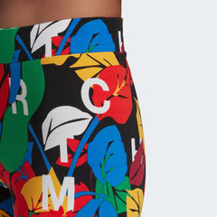 Close-up zoom on the fabric of the Adidas x Rich Mnisi Graphic Leggings, showing the intricate, colourful rose graphic print and the texture of the soft jersey knit.