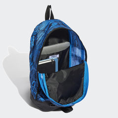 Side profile of the Adidas Adventure Backpack in blue and black, highlighting its depth and side open pockets for water bottles.